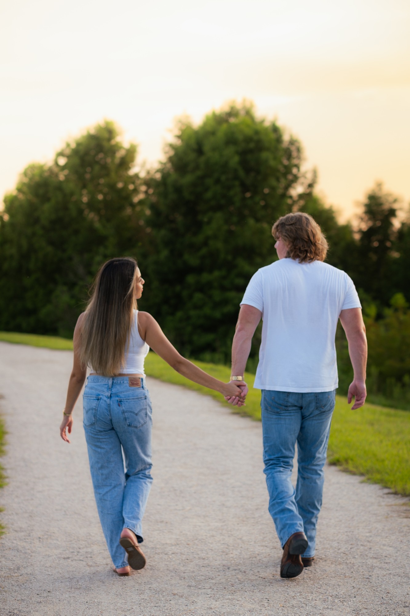 Couple walking at sunset