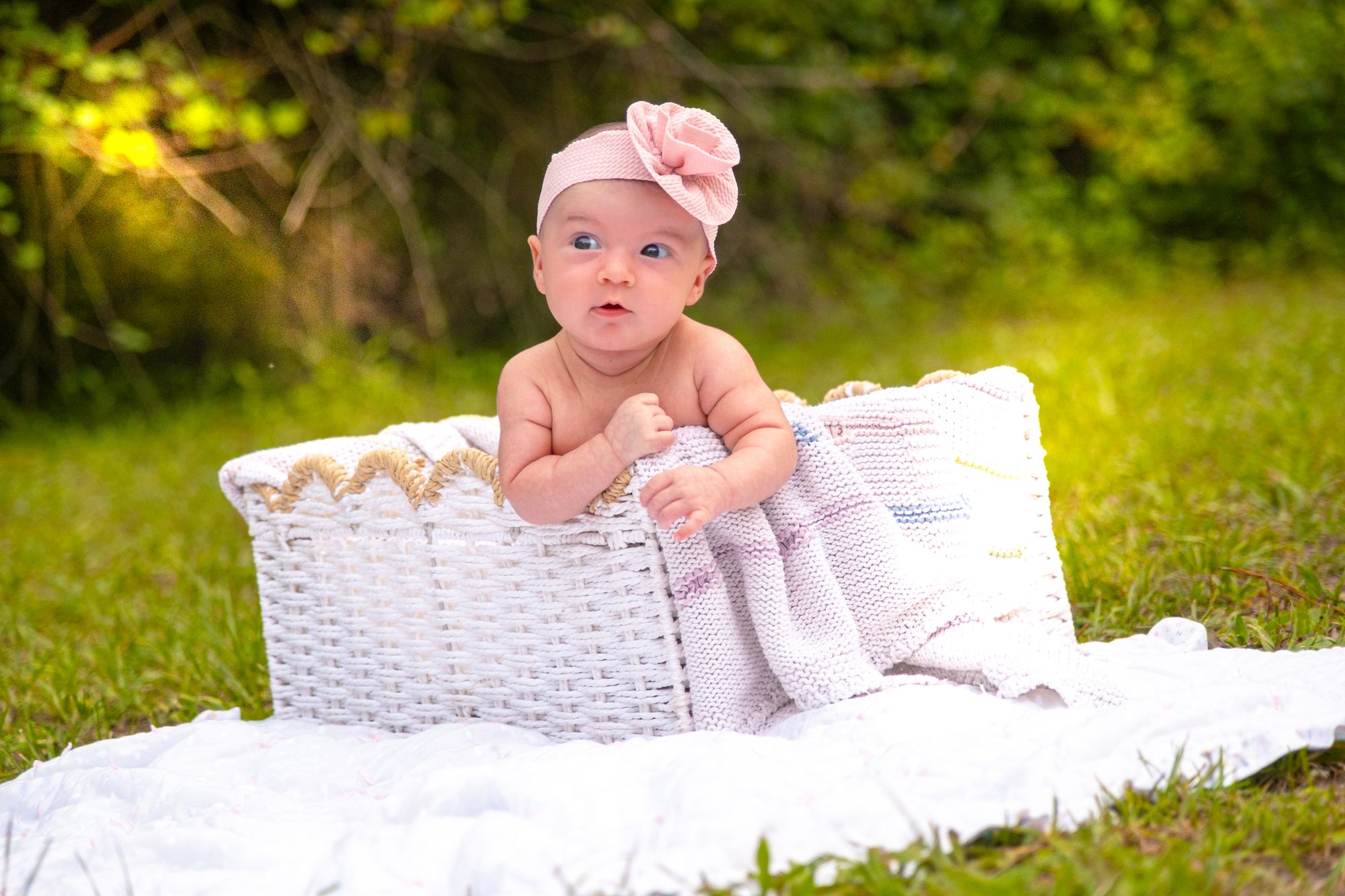 Baby in basket outdoors